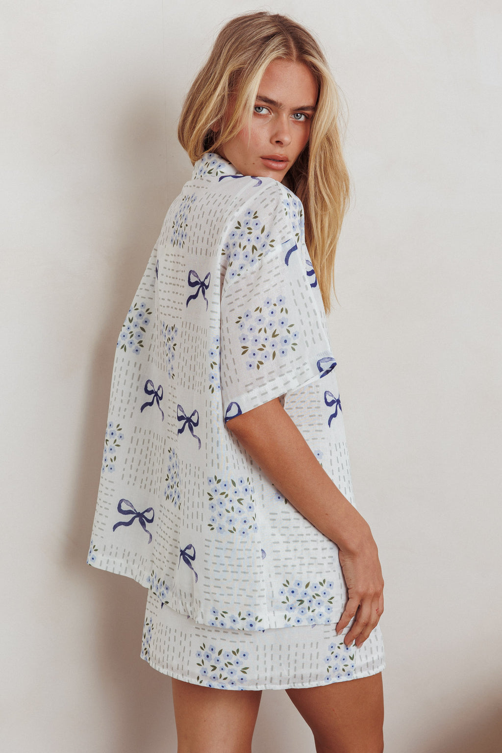 Ithaca Wrap Mini Skirt Bow Print Blue by Selfie Leslie Australia