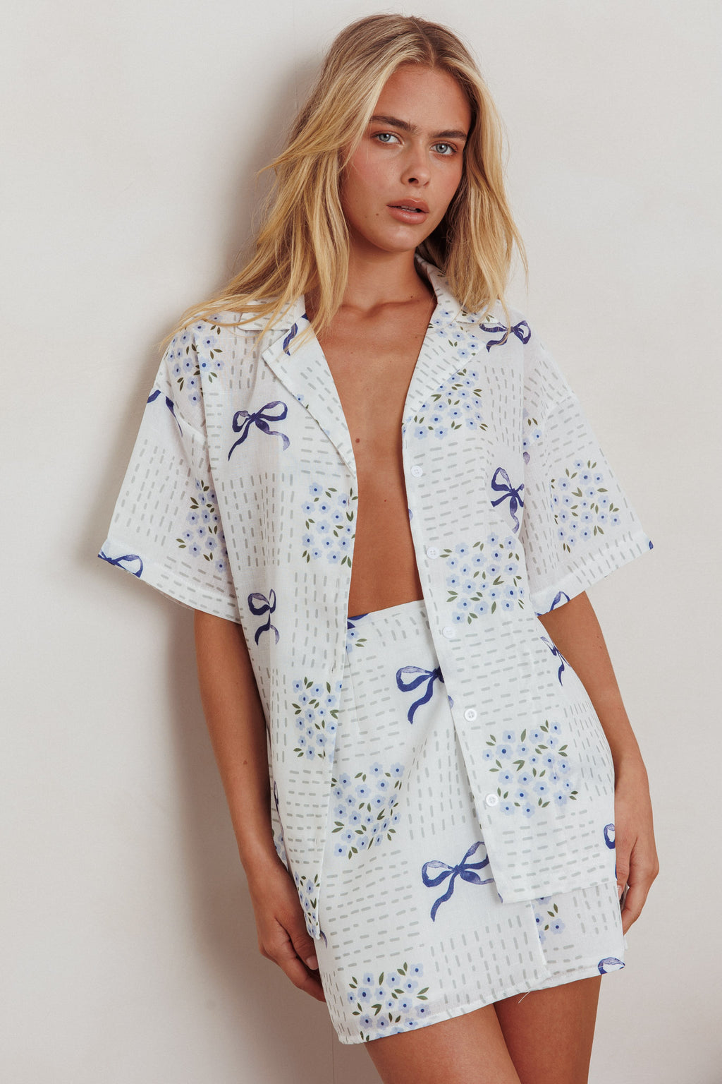 Ithaca Wrap Mini Skirt Bow Print Blue by Selfie Leslie Australia