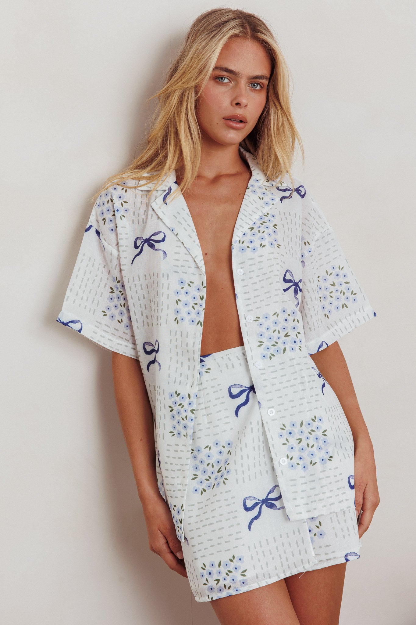 Ithaca Wrap Mini Skirt Bow Print Blue by Selfie Leslie Australia