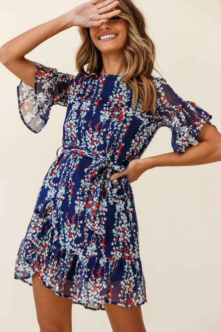 Azealia Ruffle Hem Dress Floral Print Navy by Selfie Leslie