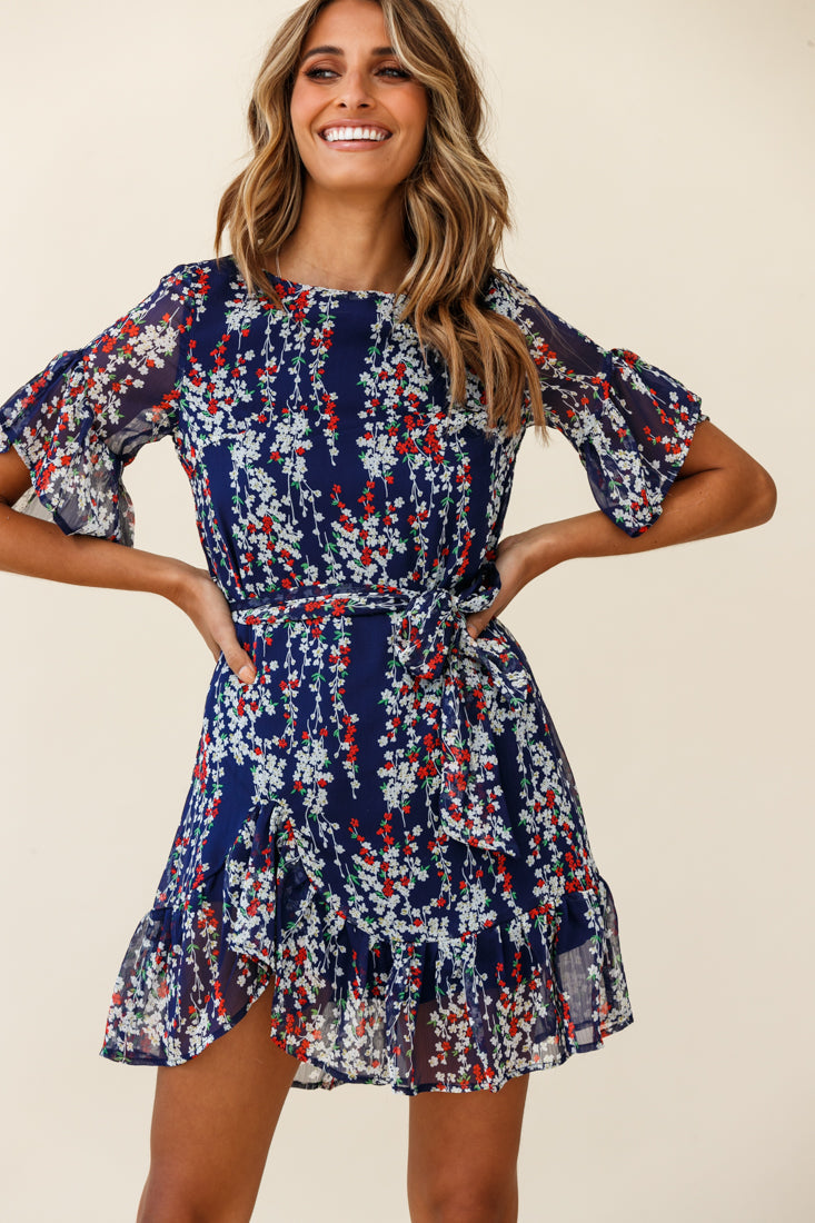 Azealia Ruffle Hem Dress Floral Print Navy by Selfie Leslie