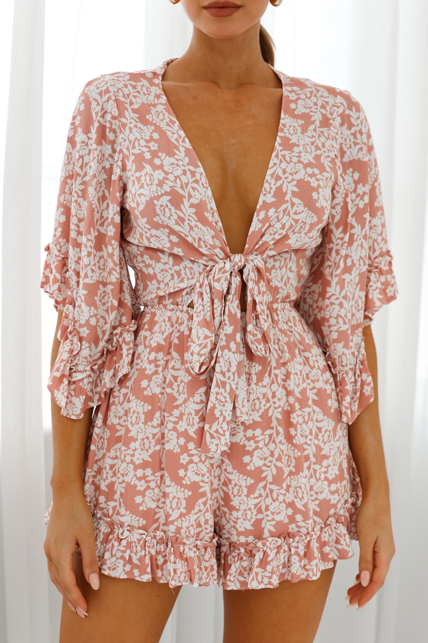 Athira Tied Bust Flared Sleeve Romper Floral Stencil Print Pink by Selfie Leslie