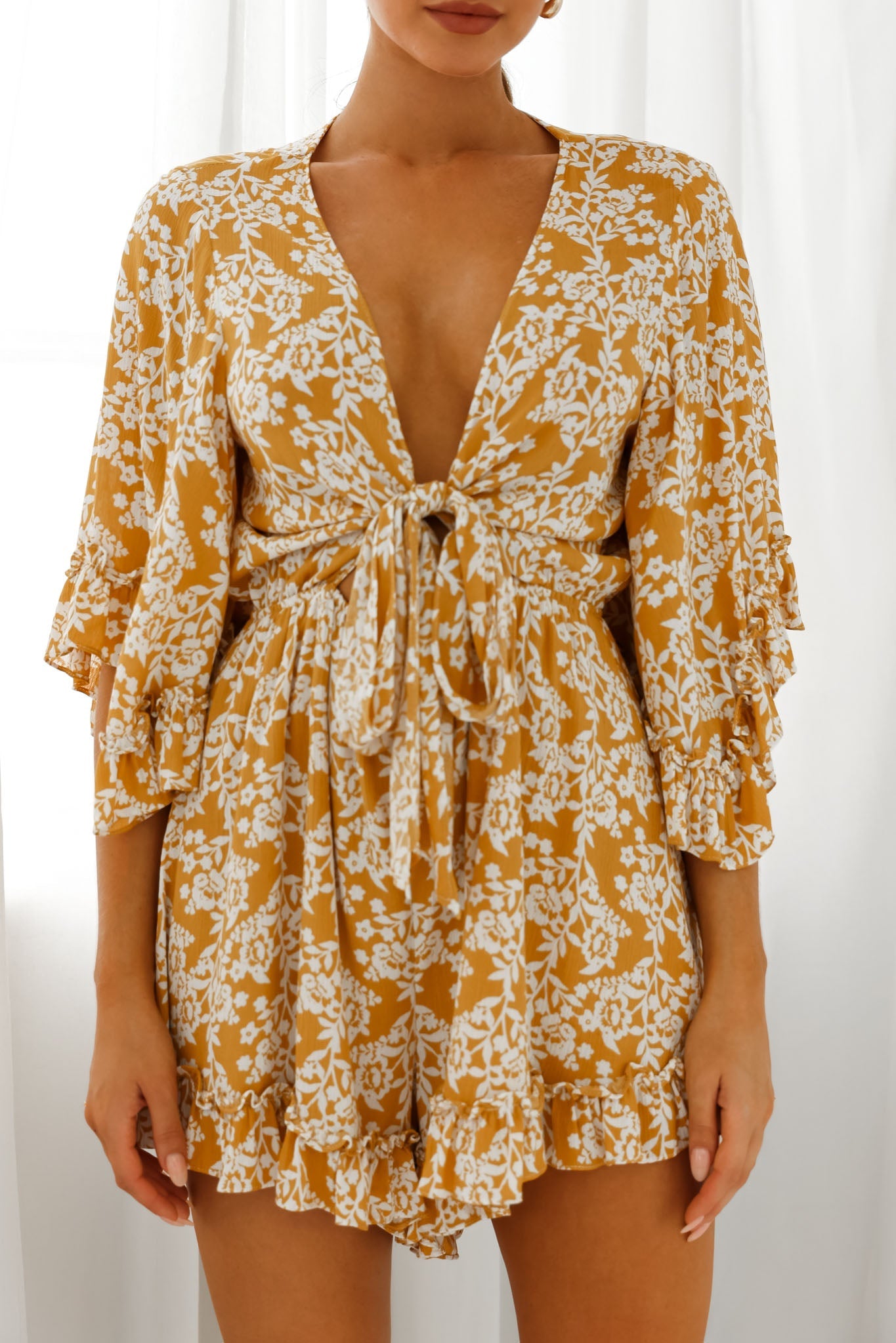 Athira Tied Bust Flared Sleeve Floral Stencil Print Romper Yellow by Selfie Leslie