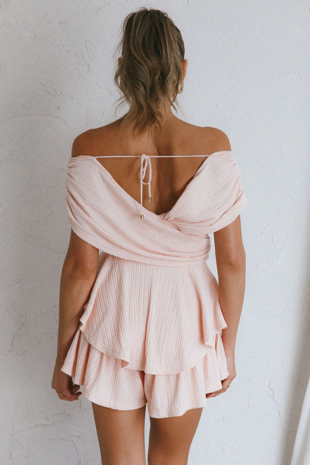 Glory Crossover Bust Layered Hem Romper Blush by Selfie Leslie