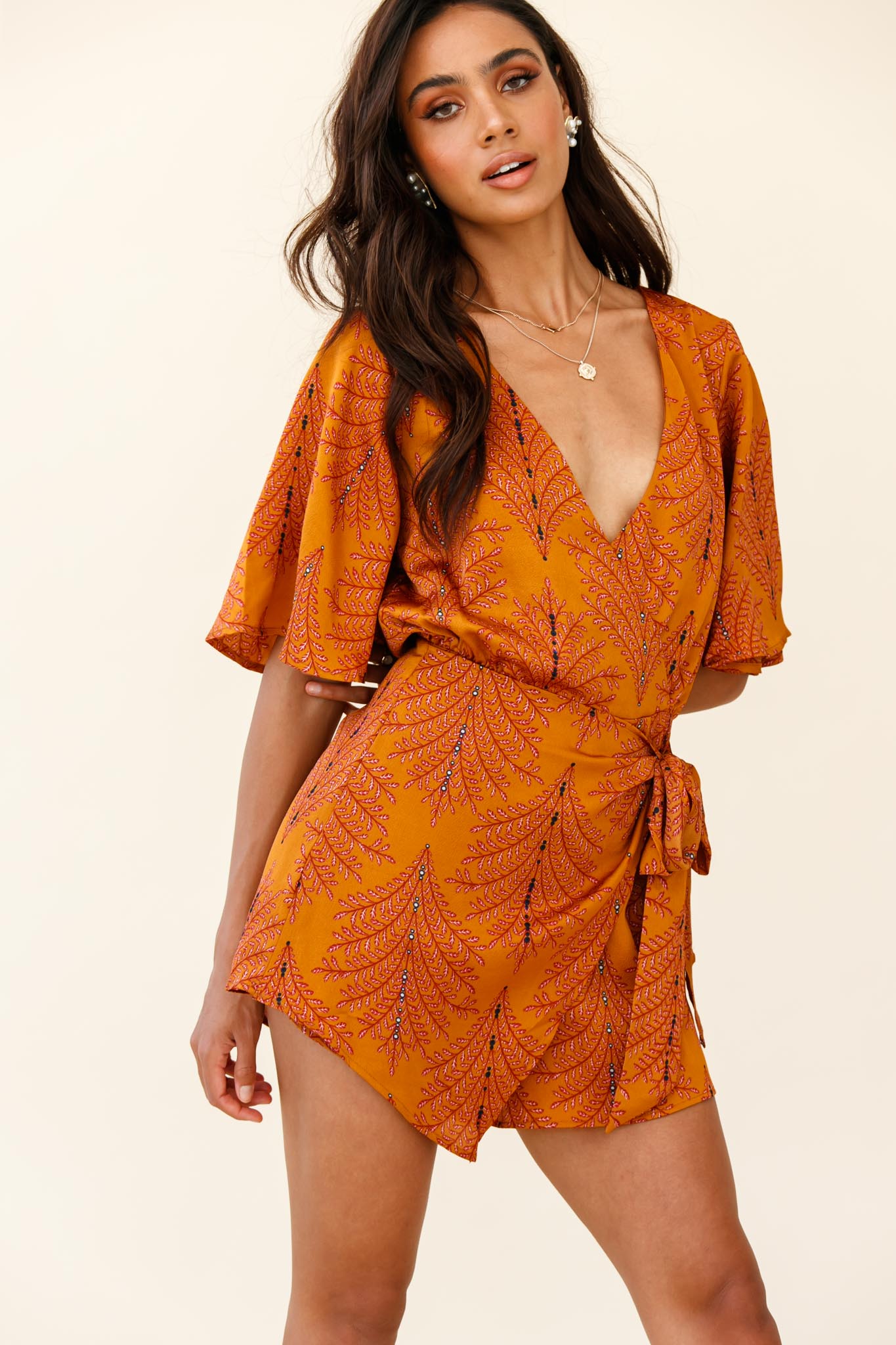 Nadi V-Neckline Wrap Romper Leaf Print Mustard by Selfie Leslie