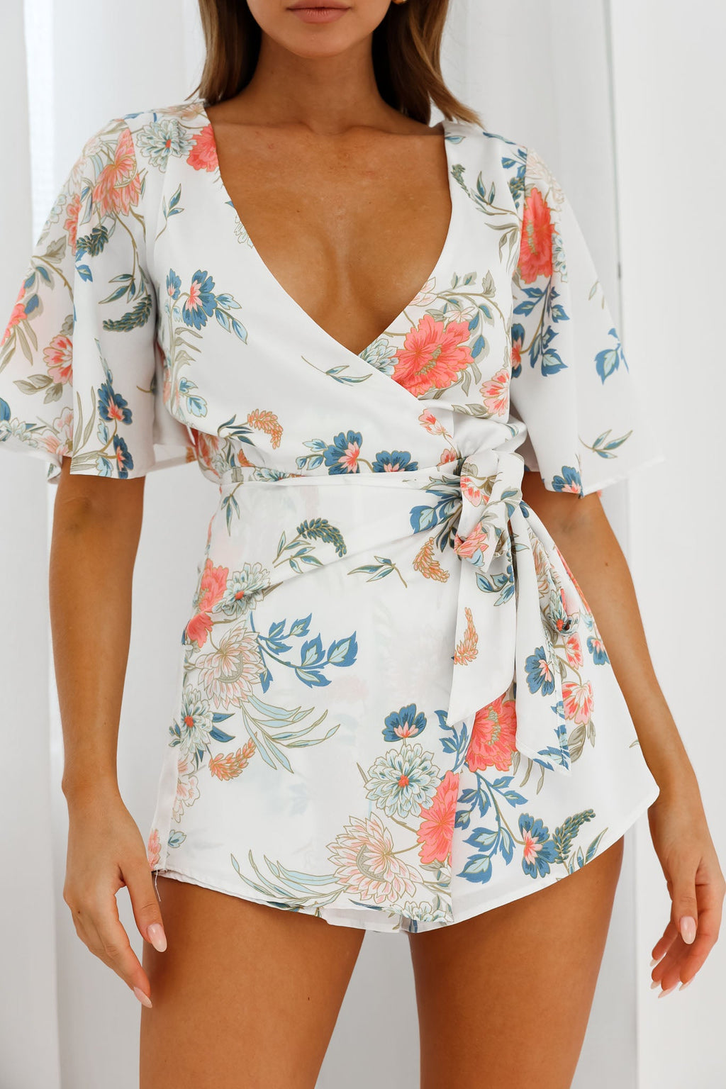 Nadi V-Neckline Wrap Romper Floral Print White by Selfie Leslie