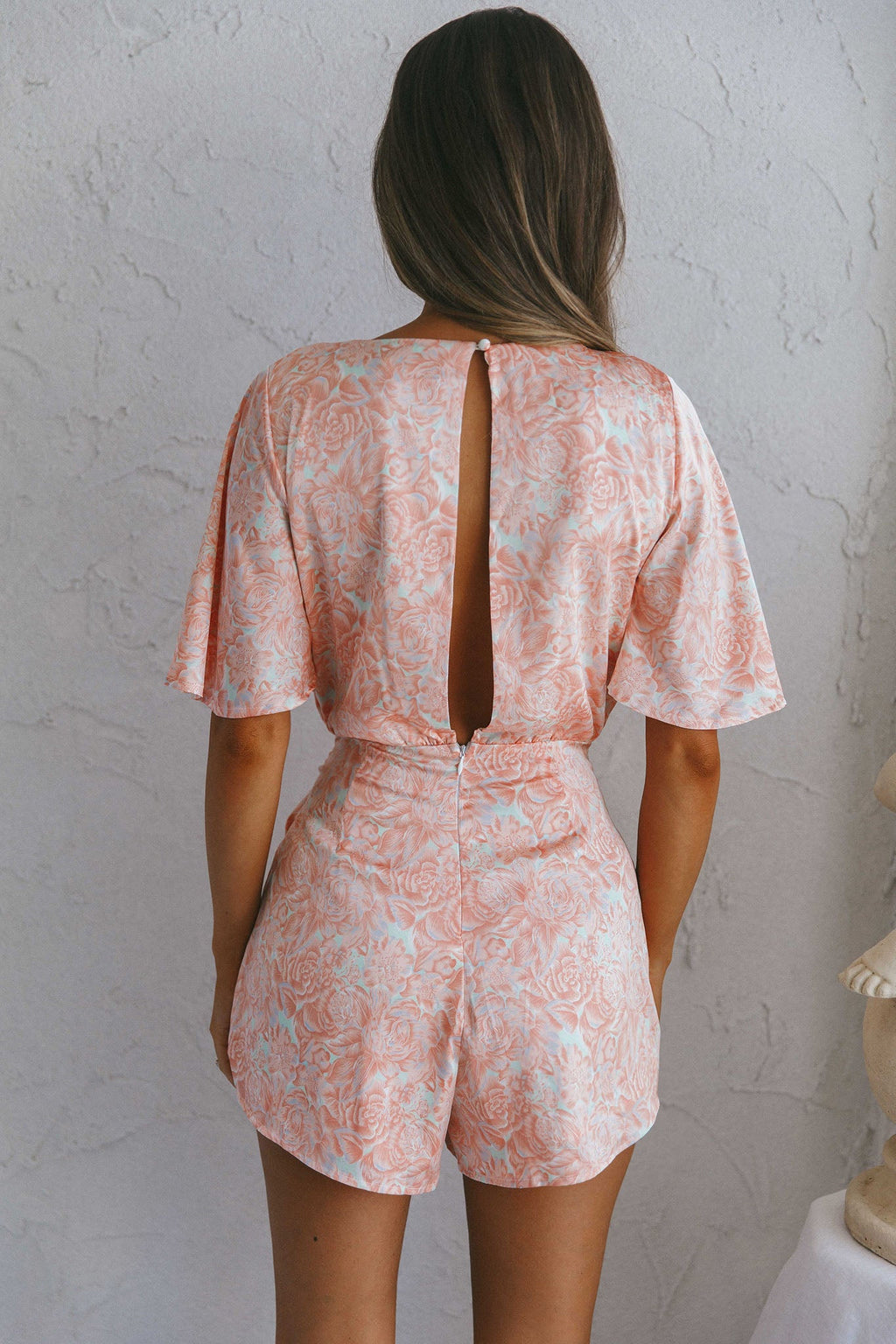 Nadi V-Neckline Wrap Romper Flower Paint Print Pink by Selfie Leslie