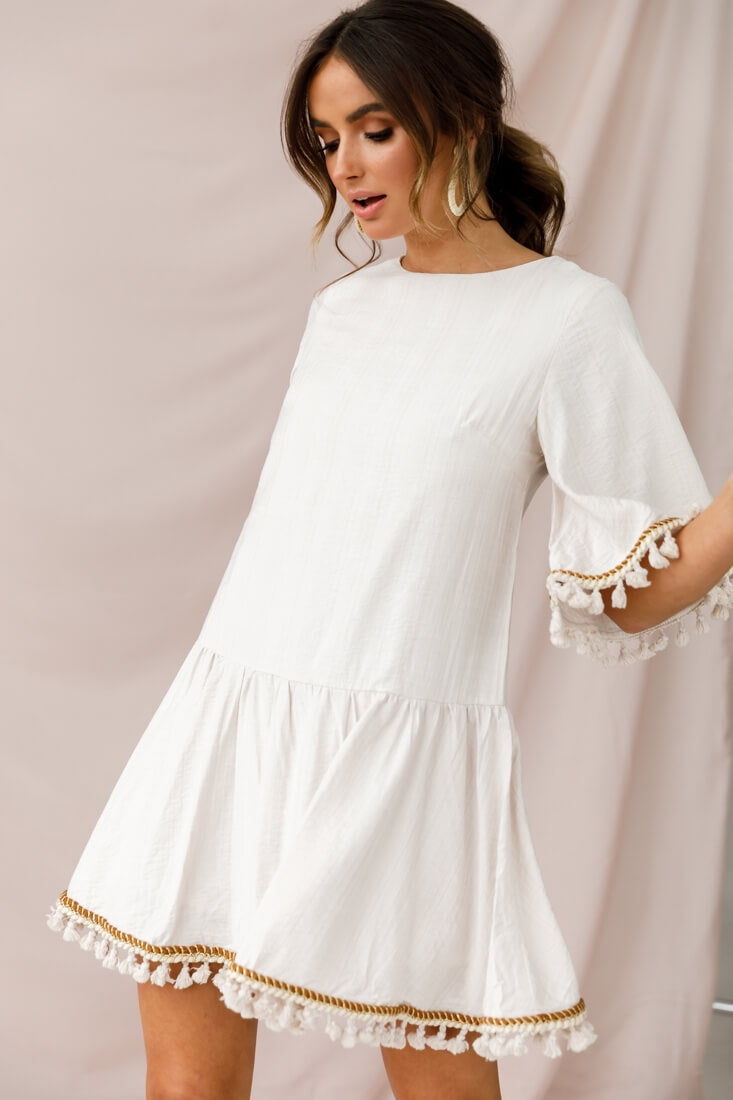 Donna Dropped Waist Tassel Dress Beige by Selfie Leslie