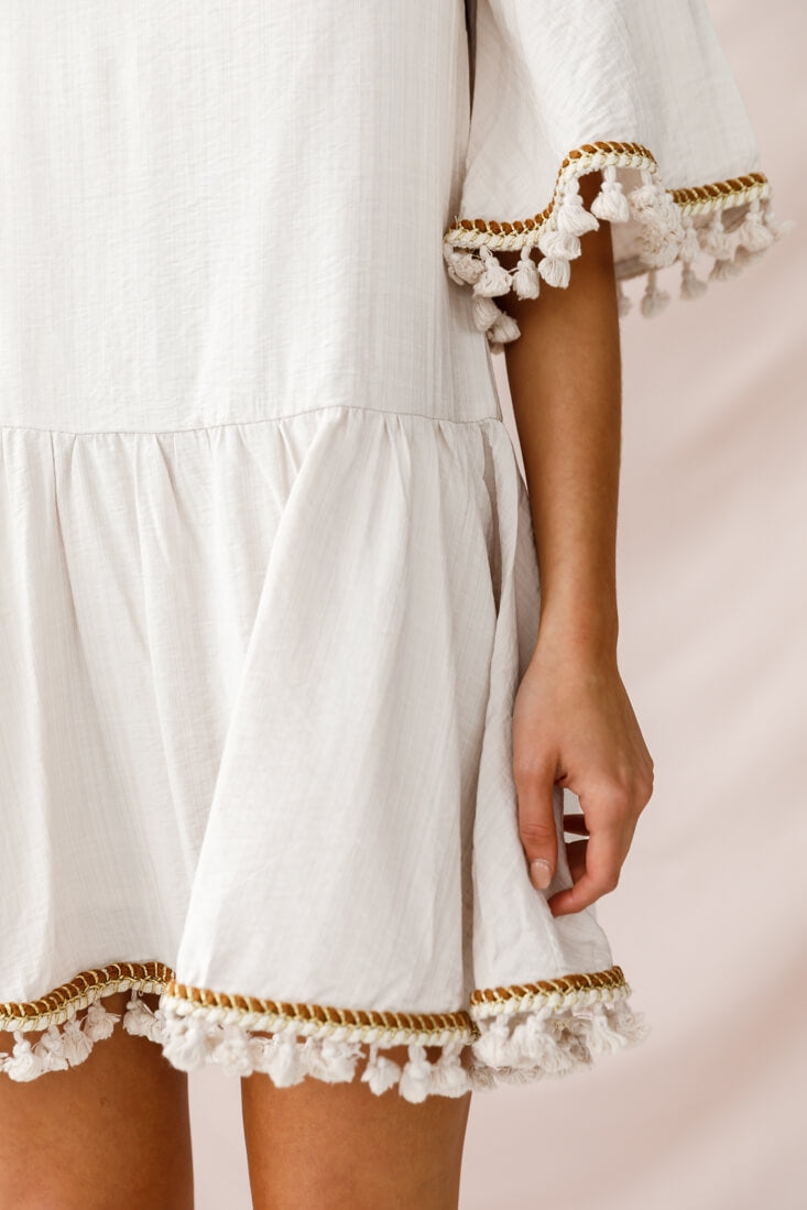 Donna Dropped Waist Tassel Dress Beige by Selfie Leslie