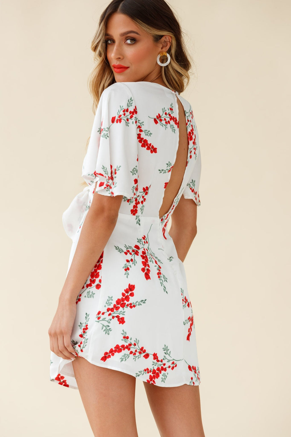 Stealing Hearts Flutter Sleeve Wrap Front Dress Floral Print White by Selfie Leslie